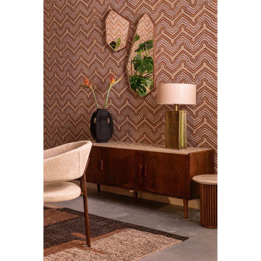 Asymmetrische wandspiegel Bryn aan een muur in het interieur