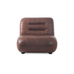 Leren Wyatt fauteuil chocolade in een interieur