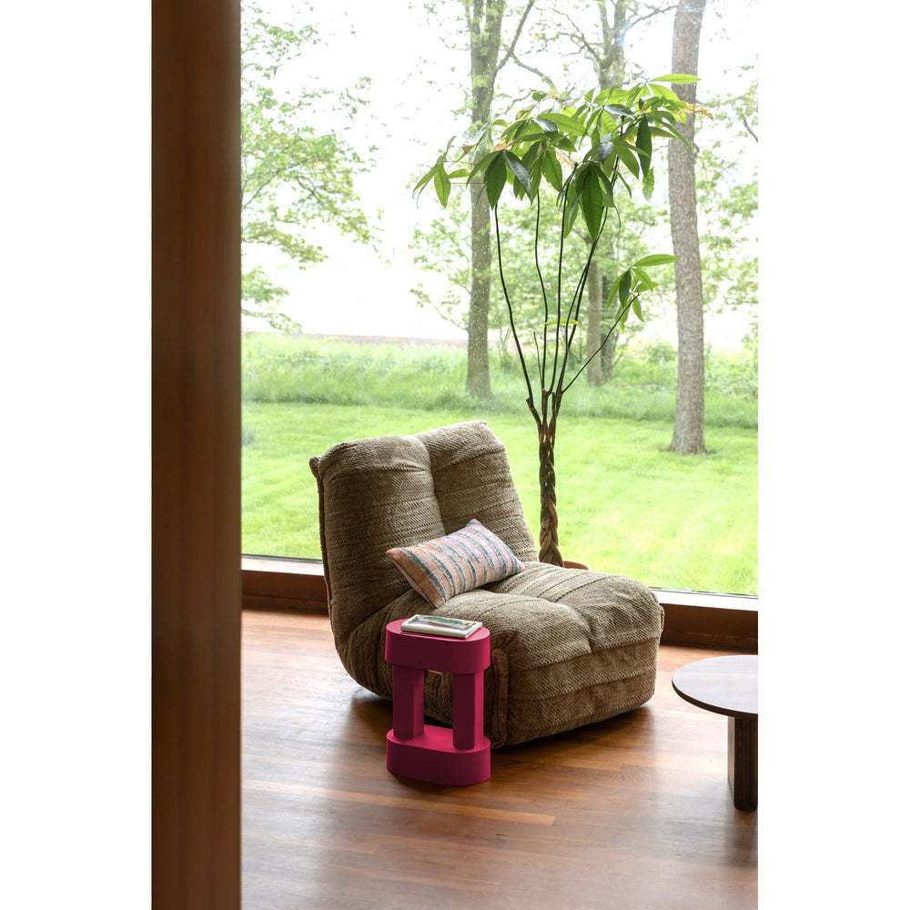 Brede Hamilton fauteuil in een woonkamer