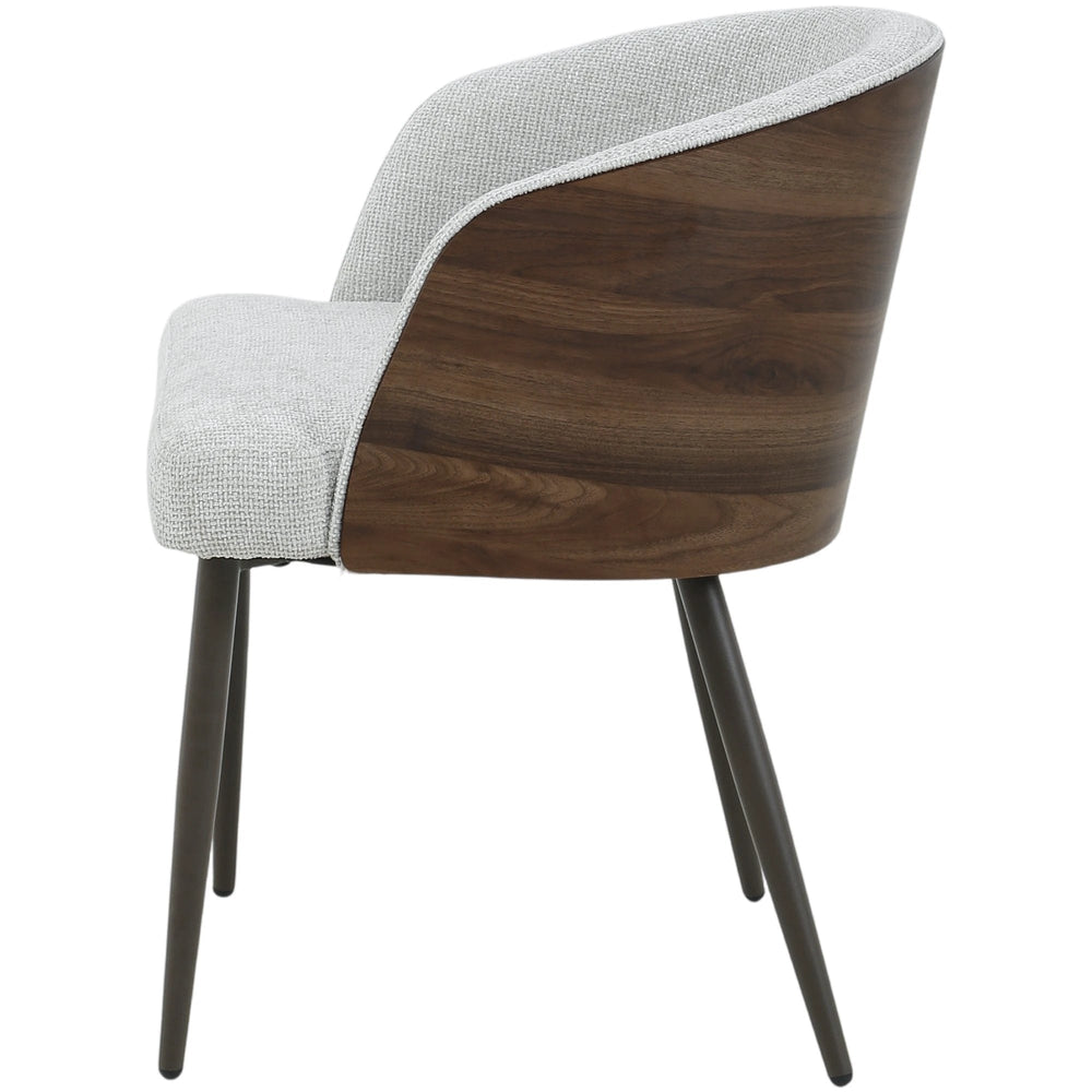 Bosca eetkamerstoel van opzij met houten rug