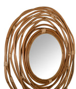 Rotan wandspiegel Kubu in een interieur
