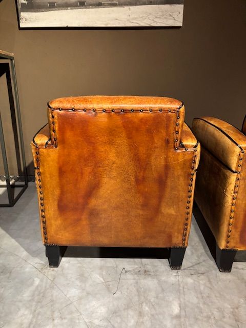 Set Vintage geleefde Schapenleren Art Deco fauteuils