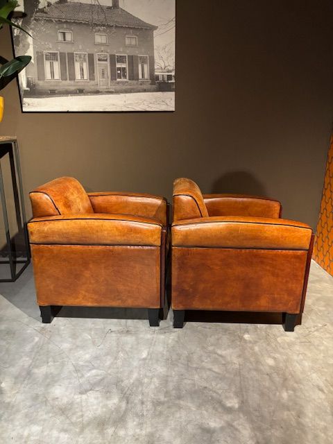 Set Vintage geleefde Schapenleren Art Deco fauteuils