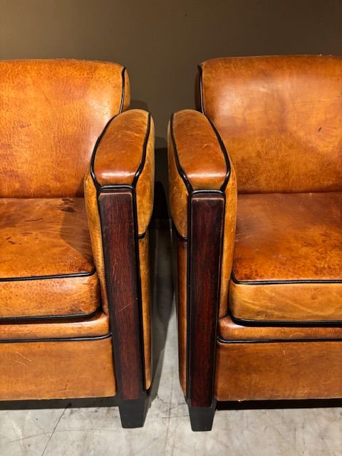 Set Vintage geleefde Schapenleren Art Deco fauteuils