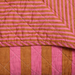 Ommezijde van de quilt plaid met eigen dessin
