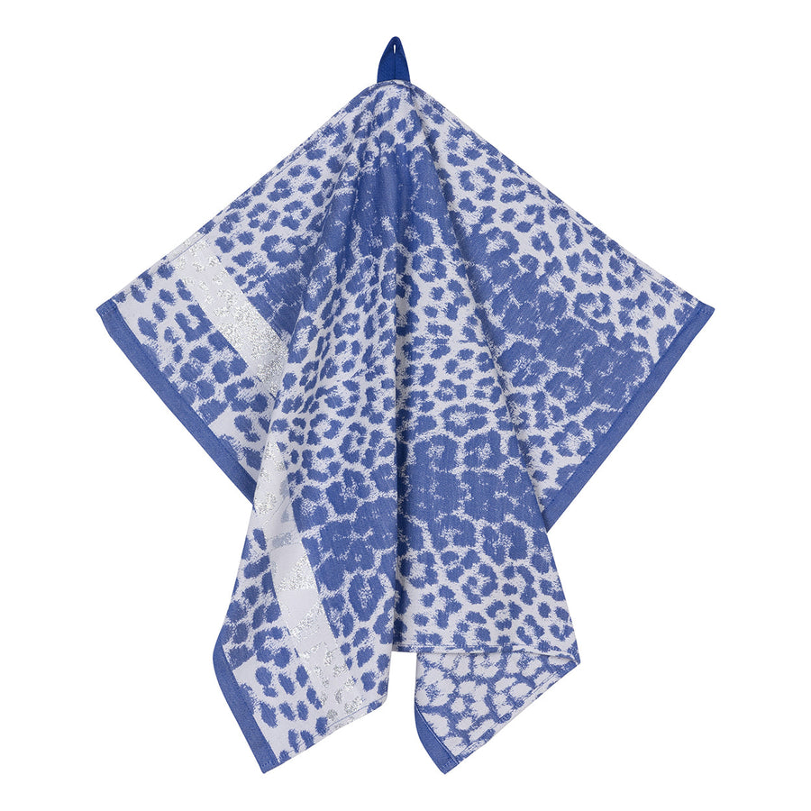 Detail van het geweven luipaarddessin in royalblauw en grijs