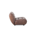 Detail van het wax leer van de Wyatt fauteuil