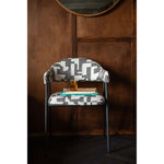 Dutchbone Miyo eetkamerstoelen aan tafel