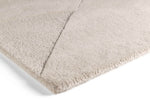 Brinker Fusion wollen vloerkleed Beige in een interieur