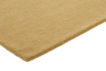 Brinker Organix wollen vloerkleed Gold in een interieur