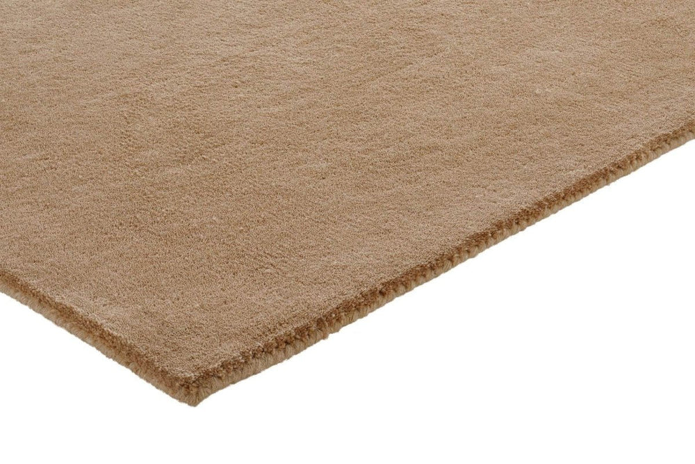 Brinker Organix wollen vloerkleed Khaki in een interieur
