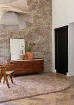 Detail van de volle hoogpolige wol