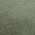 Close-up van de jacquard geweven structuur van het Maki vloerkleed