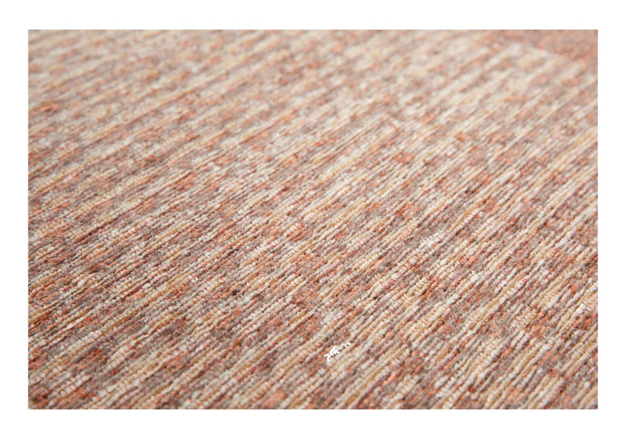 Close-up van de jacquard geweven structuur van het Nino vloerkleed Cookie