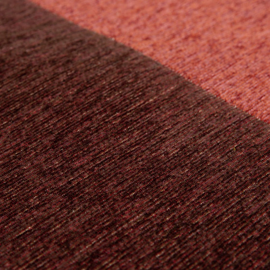 Close-up van de jacquard geweven structuur van het Nomi vloerkleed