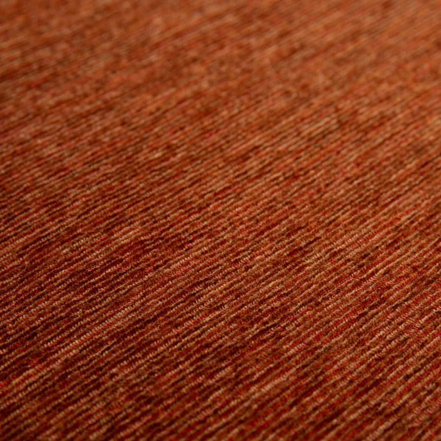 Close-up van de jacquard geweven structuur van het Sola vloerkleed