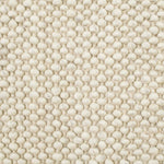 Close-up van de wol van het Brinker Boola vloerkleed Ivory