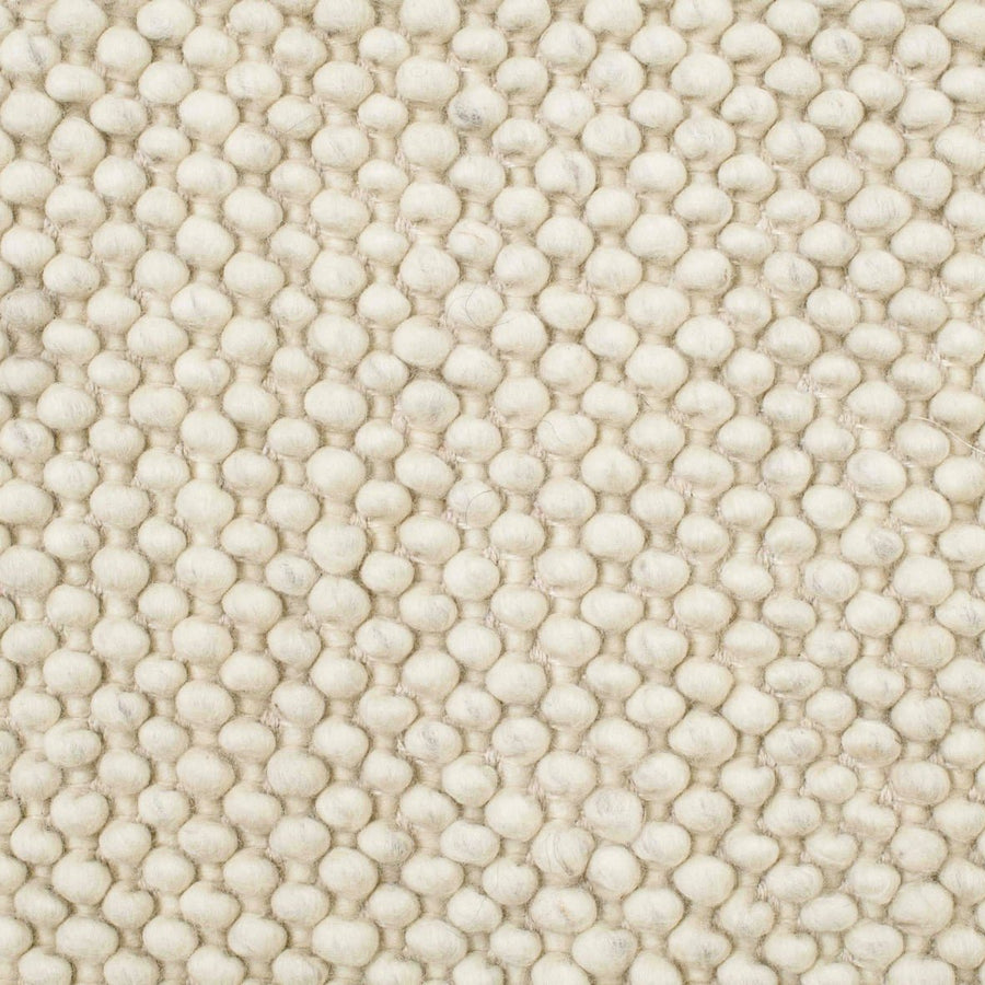 Close-up van de wol van het Brinker Boola vloerkleed Ivory