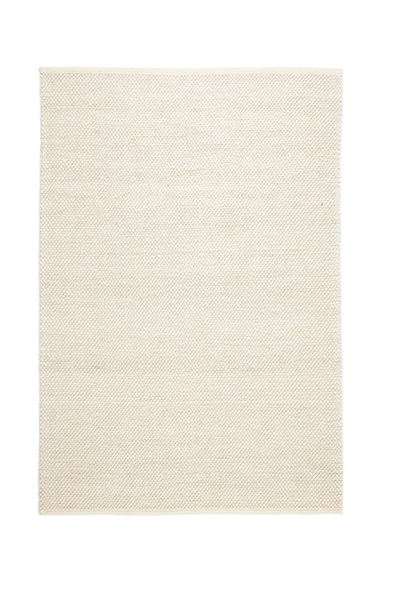 Brinker Boola wollen vloerkleed Ivory in een interieur