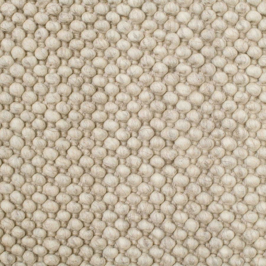 Close-up van de wol van het Brinker Boola vloerkleed Latte